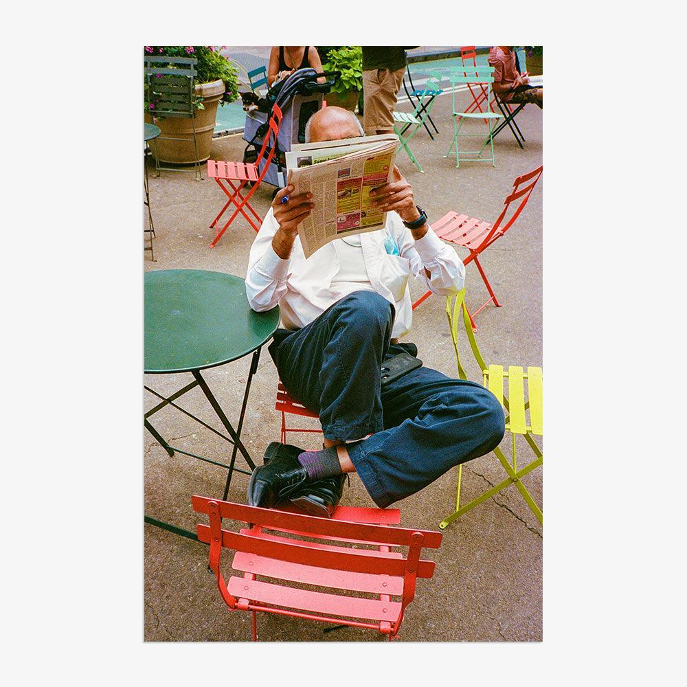 Guy Reading Paper - Image 4