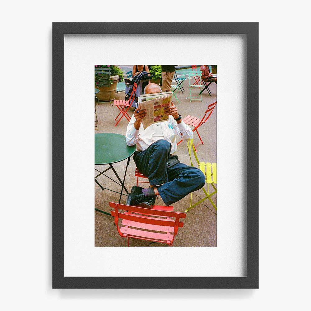 Guy Reading Paper - Image 6